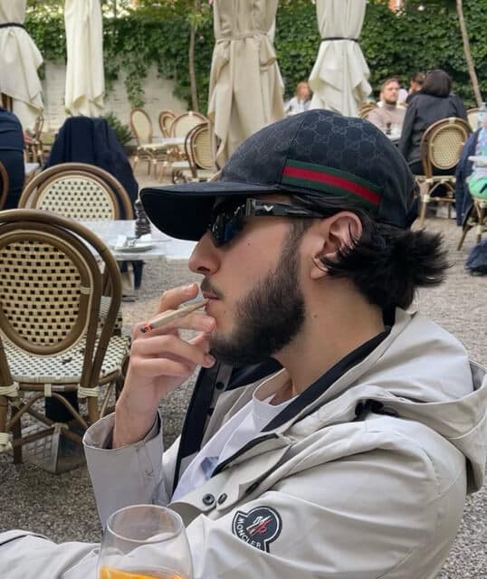 German rapper rb wearing his gucci cap